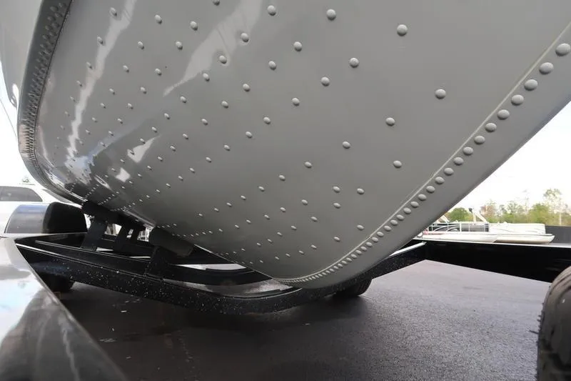 Slide: The Image of 2008 Starcraft STX PRO 2050 boat hull on trailer, close-up view. - 8