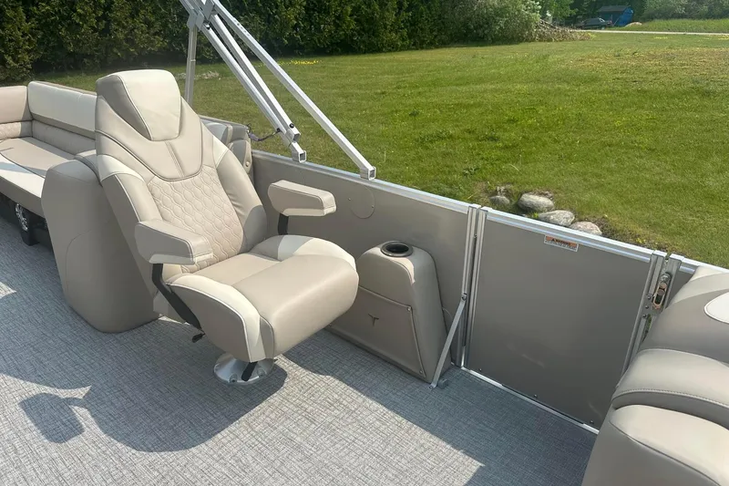 Slide: The Image of Luxurious interior of 2025 Tahoe 2585 pontoon boat with plush seating and modern design. - 15