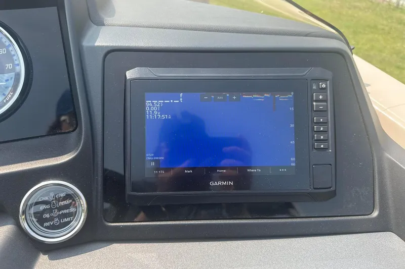Slide: The Image of Garmin navigation display on 2025 Tahoe 2585 dashboard, showing digital interface and controls. - 20