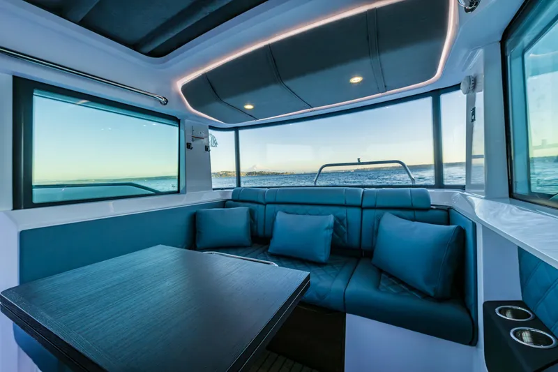 Slide: The Image of Luxurious interior of 2022 Axopar 37 XC boat with ocean view. - 16