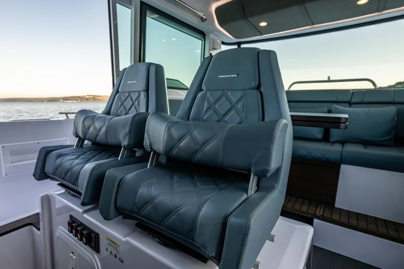 Slide: The Image of Luxurious seating inside 2022 Axopar 37 XC boat, featuring modern design and comfort. - 19