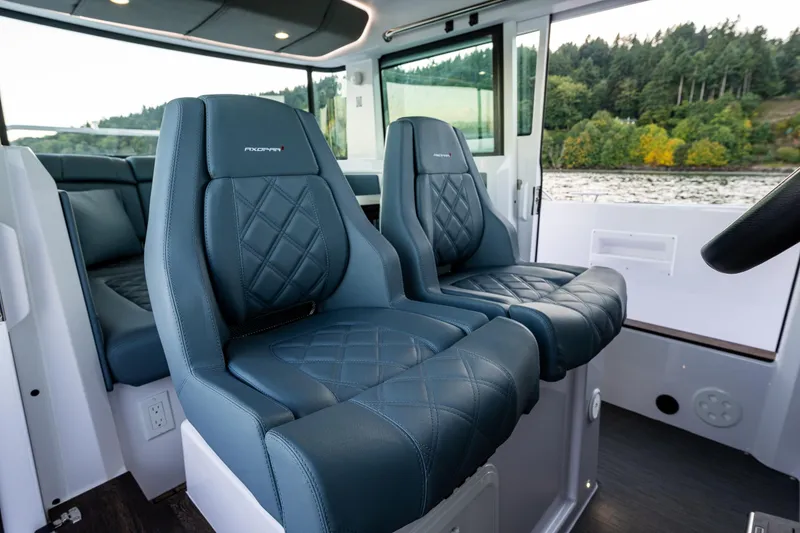 Slide: The Image of Luxurious interior seating of 2022 Axopar 37 XC boat with quilted leather design. - 20
