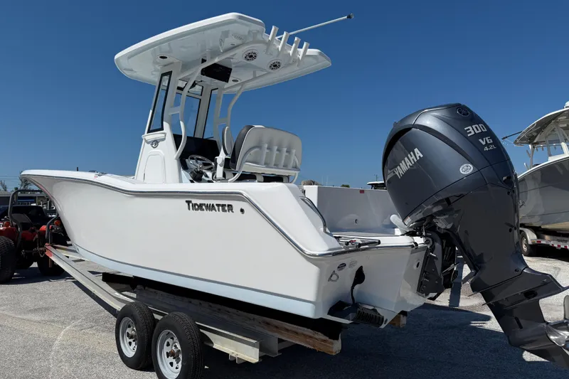 The Image of 2026 Tidewater 232 CC Adventure boat with Yamaha 300 V6 engine on trailer. - 1