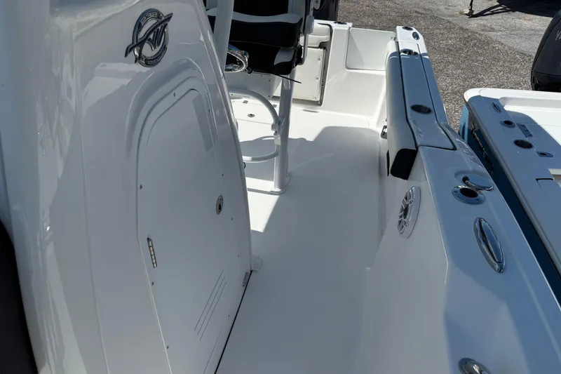 Slide: The Image of 2026 Tidewater 232 CC Adventure boat interior, featuring sleek design and modern amenities. - 14