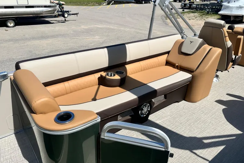 Slide: The Image of Luxurious seating on 2025 Tahoe 2585 pontoon boat with cup holders and stylish upholstery. - 10