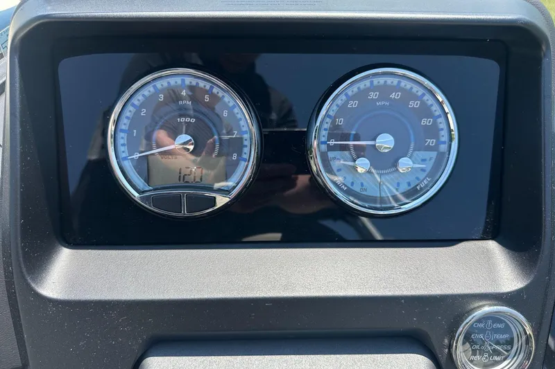Slide: The Image of Dashboard of 2025 Tahoe 2585 showing RPM and speedometer gauges. - 15