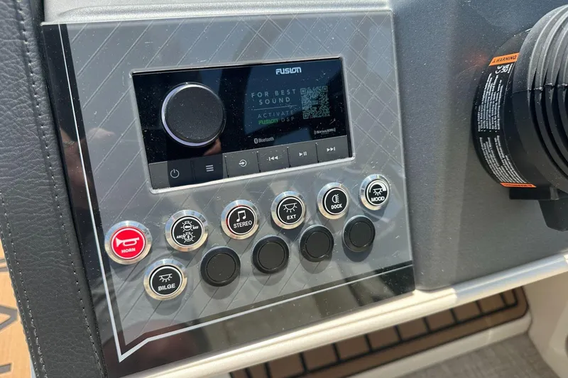 Slide: The Image of 2025 Tahoe 2585 control panel with stereo and function buttons. - 17