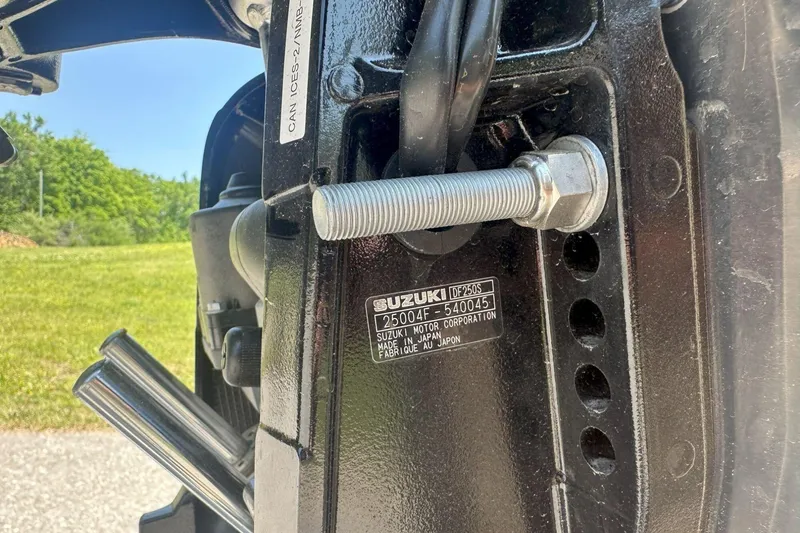 Slide: The Image of Close-up of a Suzuki DF250S engine part on a 2025 Tahoe 2585 boat. - 7