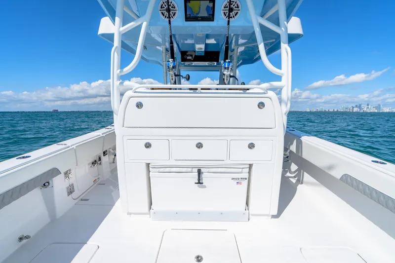 Slide: The Image of 2025 Invincible 43 Open Fisherman boat deck with storage compartments. - 17