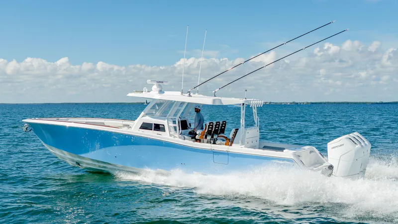 Slide: The Image of 2025 Invincible 43 Open Fisherman boat cruising on the ocean. - 1
