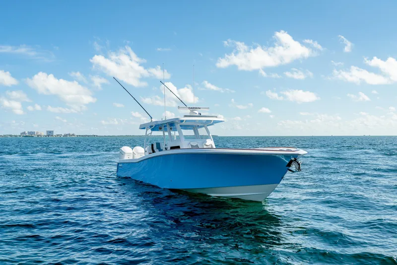 Slide: The Image of 2025 Invincible 43 Open Fisherman boat on open water. - 7