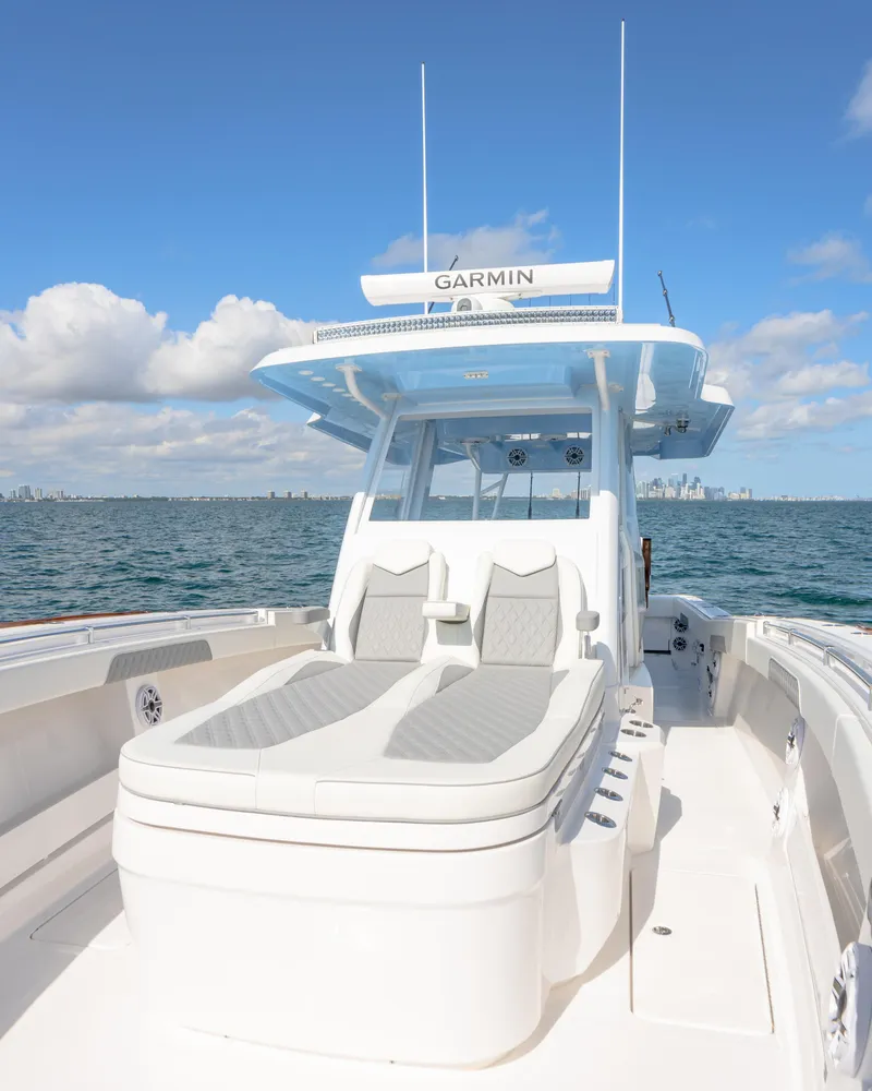 Slide: The Image of 2025 Invincible 43 Open Fisherman boat on open water. - 10