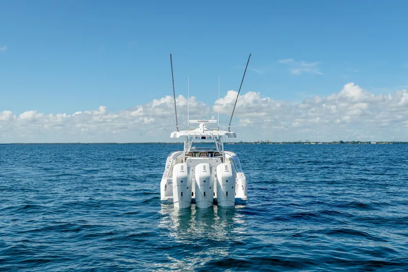 Slide: The Image of 2025 Invincible 43 Open Fisherman boat on open water with clear blue sky. - 4