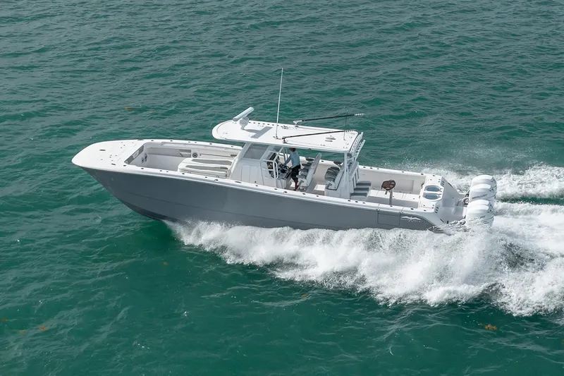 The Image of 2026 Invincible 46 Catamaran cruising on open water, showcasing sleek design and powerful engines. - 0