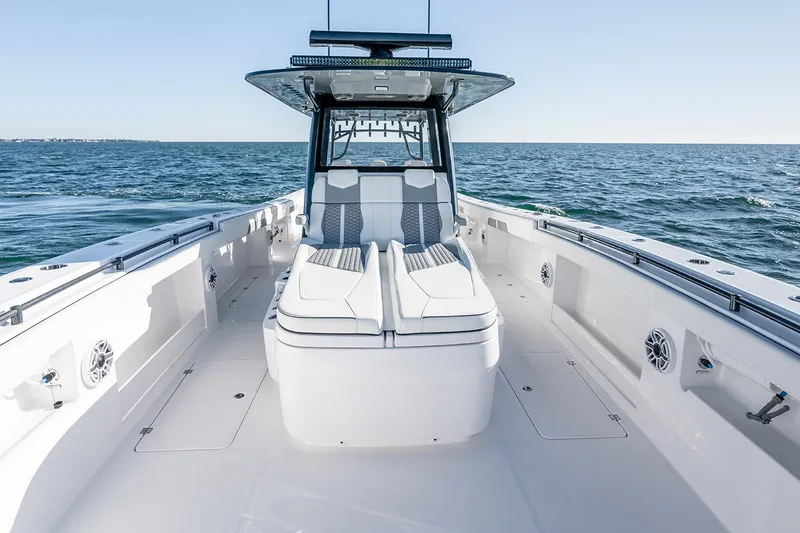 Slide: The Image of 2026 Invincible 46 Catamaran on open sea, showcasing spacious deck and modern design. - 5