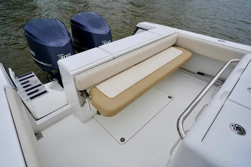 Slide: The Image of 2015 Southport 29 FE boat with dual Yamaha engines and foldable seating. - 37