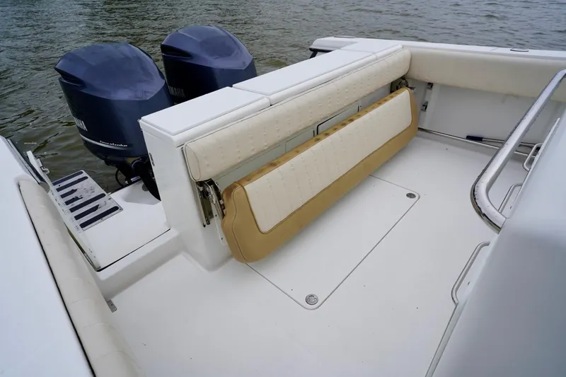 Slide: The Image of 2015 Southport 29 FE boat with dual Yamaha engines and foldable seating. - 41
