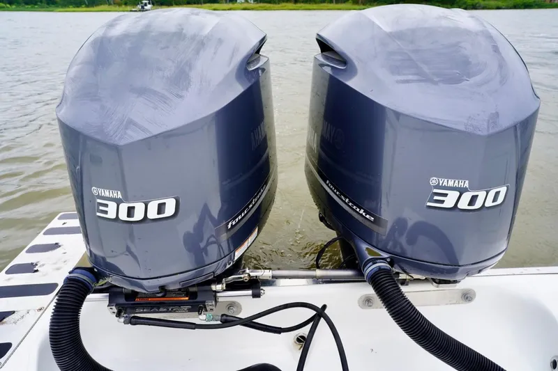 Slide: The Image of Twin Yamaha 300 outboard engines on a 2015 Southport 29 FE boat. - 56