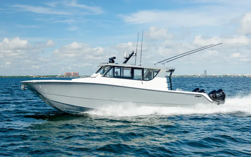 The Image of 2025 Invincible 46 Pilothouse cruising on open water. - 0