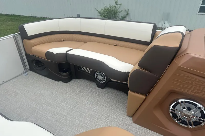 Slide: The Image of Luxurious seating on 2025 Tahoe 2585 boat with premium upholstery and built-in speakers. - 30