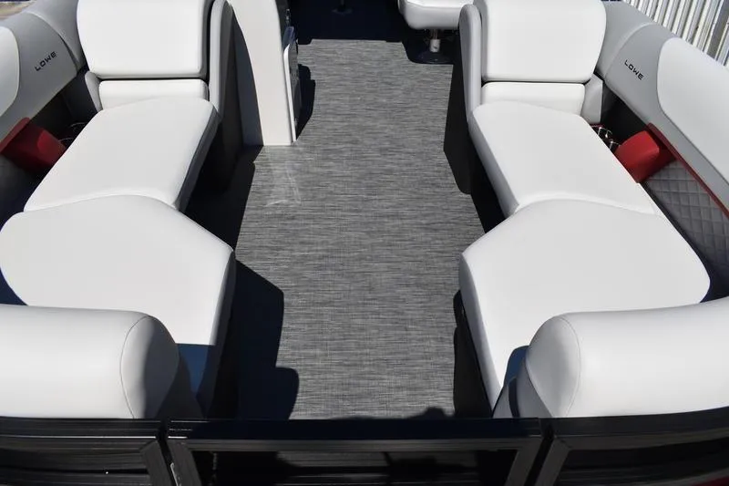 Slide: The Image of 2026 Lowe SS 210 WT boat interior with gray cushioned seating and cup holders. - 11