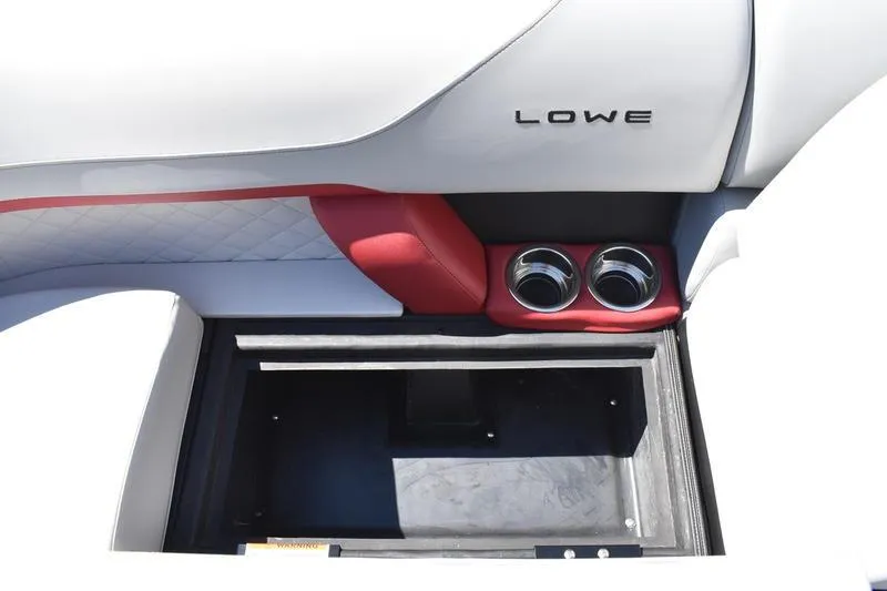 Slide: The Image of Interior storage compartment of 2026 Lowe SS 210 WT boat, featuring cushioned seating. - 15