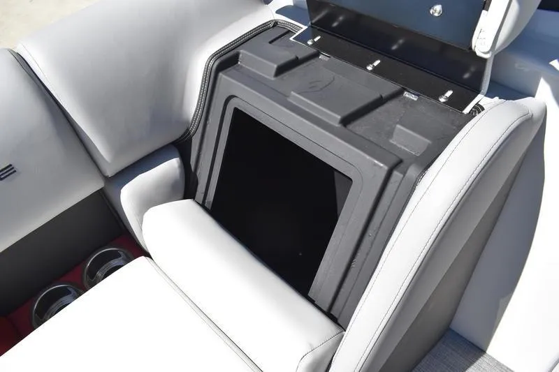 Slide: The Image of Open storage compartment in 2026 Lowe SS 210 WT boat with cushioned seating. - 17