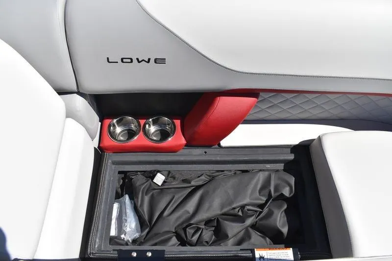 Slide: The Image of 2026 Lowe SS 210 WT boat interior with white and red quilted upholstery. - 21