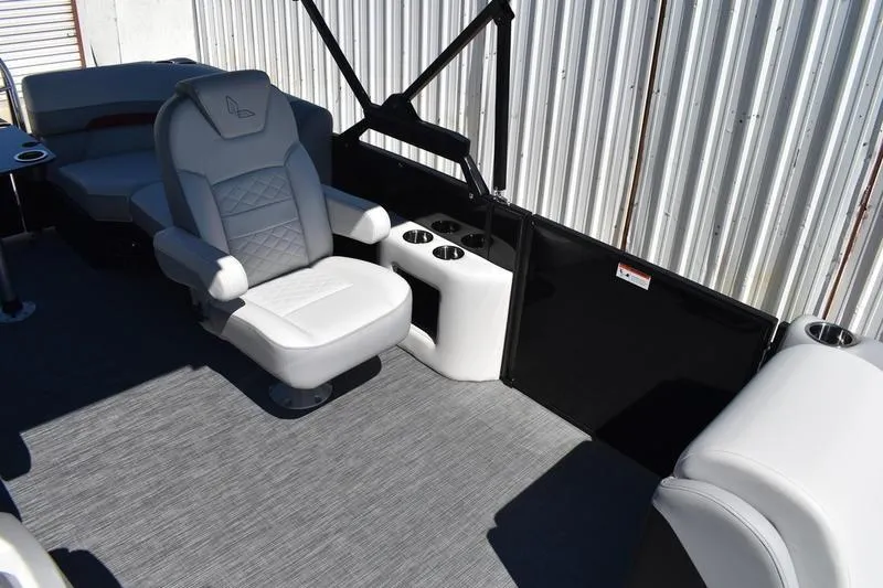 Slide: The Image of 2026 Lowe SS 210 WT boat interior with gray seating and cup holders. - 26