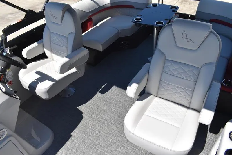 Slide: The Image of Steering console of 2026 Lowe SS 210 WT boat with gauges and controls. - 34
