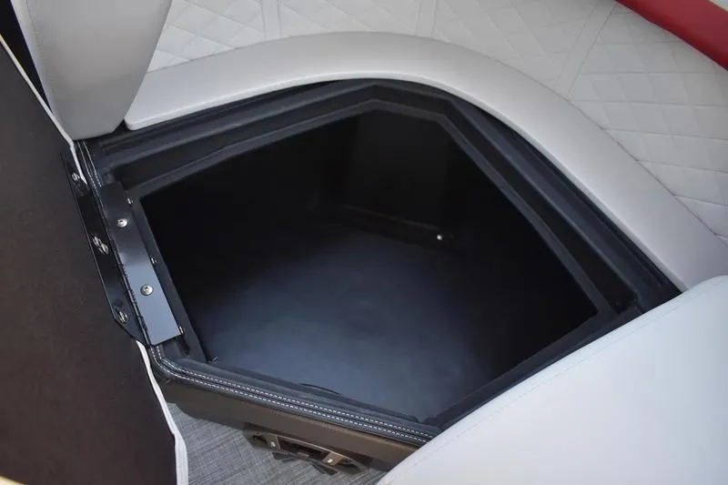 Slide: The Image of Storage compartment in 2026 Lowe SS 210 WT boat with cushioned seating. - 46