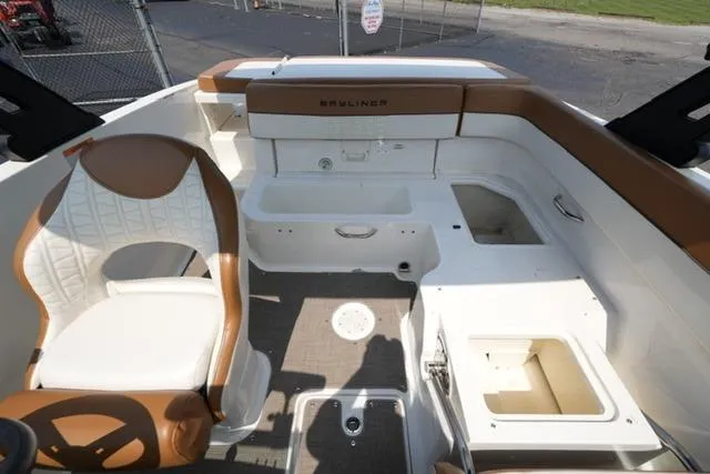Slide: The Image of 2019 Bayliner VR5 Bowrider I/O interior with seating and storage compartments. - 15