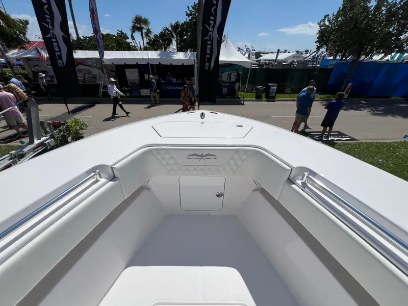 Slide: The Image of 2024 Invincible 33 Open Fisherman boat at an outdoor exhibition. - 4