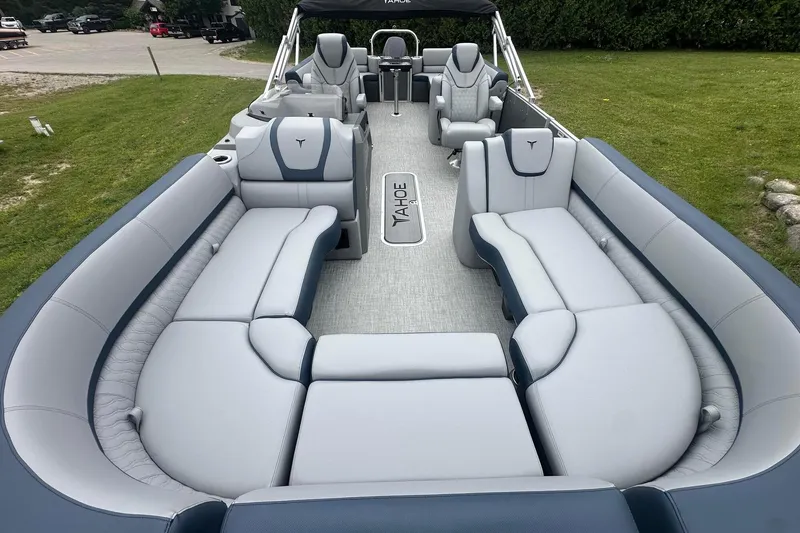 Slide: The Image of Luxurious 2025 Tahoe 2585 pontoon boat interior with plush seating and modern design. - 11