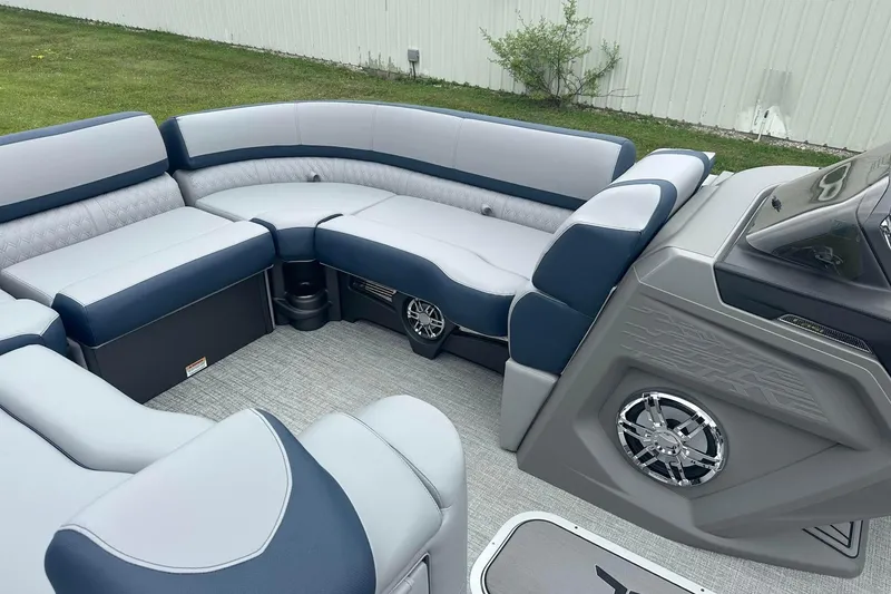 Slide: The Image of 2025 Tahoe 2585 boat interior with luxurious seating and modern design. - 12