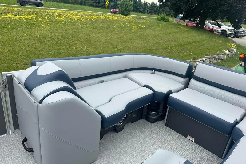 Slide: The Image of Luxurious seating on 2025 Tahoe 2585 pontoon boat, featuring modern design and comfort. - 13