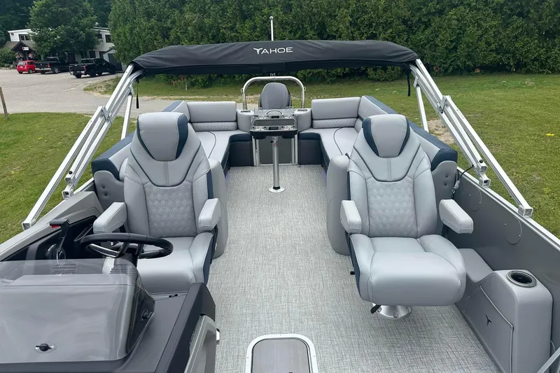 Slide: The Image of 2025 Tahoe 2585 boat interior with luxurious seating and modern design. - 16