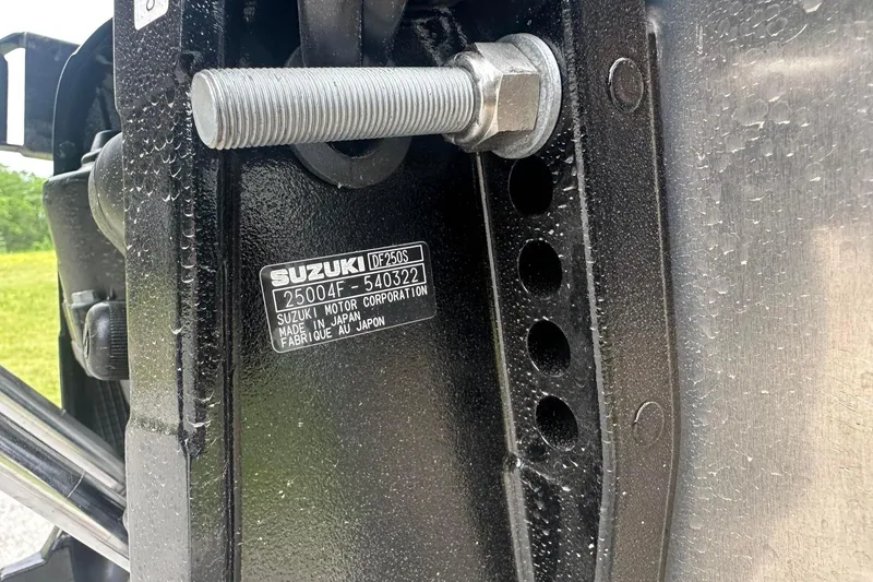 Slide: The Image of Close-up of a Suzuki motor component with identification plate, Tahoe 2585, 2025 model. - 7