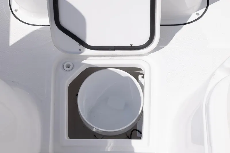 Slide: The Image of Open storage compartment on 2026 Sea Hunt Gamefish 28 Forward Seating boat. - 11