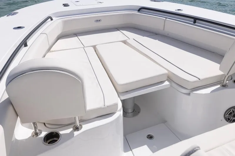 Slide: The Image of 2026 Sea Hunt Gamefish 28 Forward Seating with luxurious white cushioned seats. - 14
