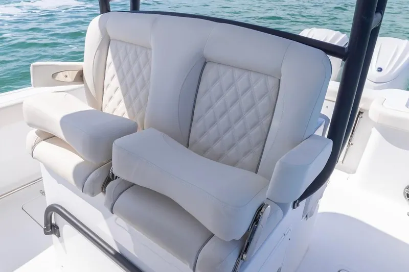 Slide: The Image of Luxurious seating on 2026 Sea Hunt Gamefish 28 boat, featuring diamond-stitched upholstery. - 19