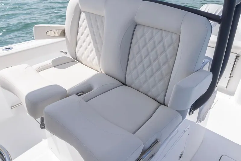 Slide: The Image of Luxurious seating on 2026 Sea Hunt Gamefish 28 boat, featuring diamond-stitched upholstery. - 20