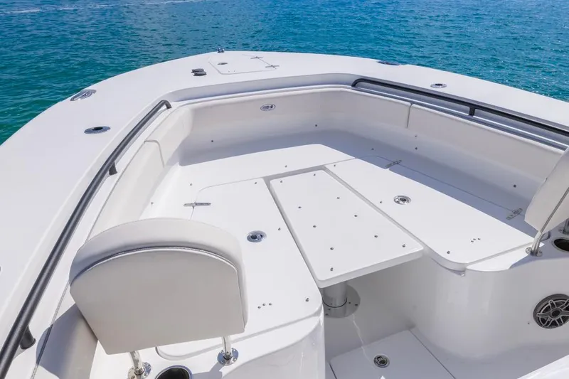 Slide: The Image of 2026 Sea Hunt Gamefish 28 Forward Seating boat on clear blue water. - 5