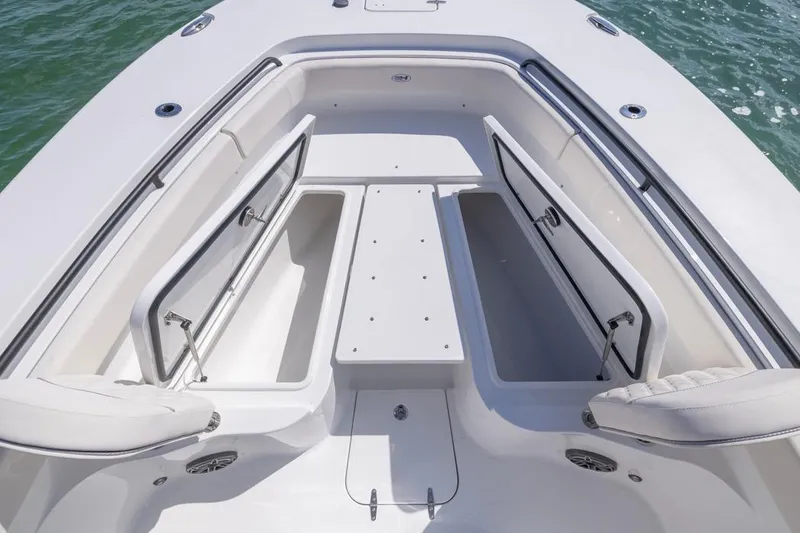 Slide: The Image of 2026 Sea Hunt Gamefish 28 Forward Seating boat with open storage compartments. - 6