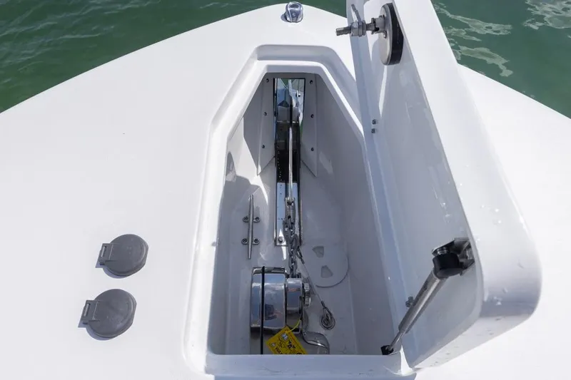 Slide: The Image of Anchor compartment of 2026 Sea Hunt Gamefish 28 Forward Seating boat. - 9