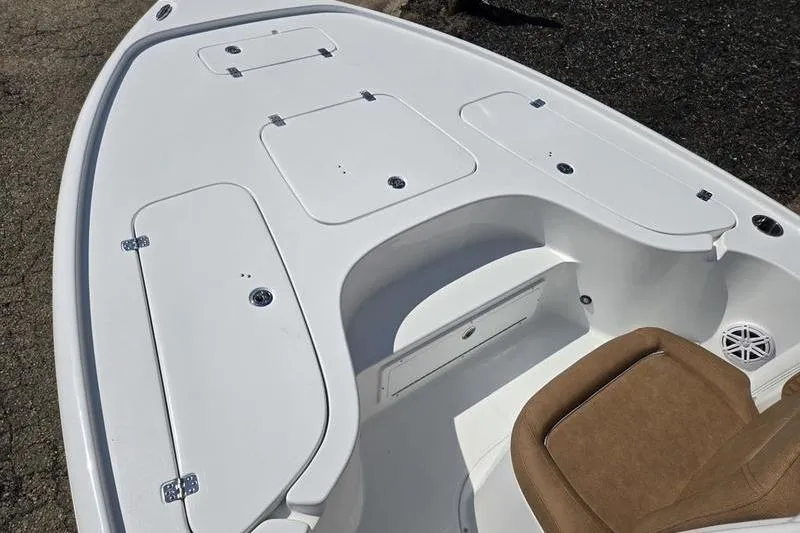 Slide: The Image of 2026 Sea Hunt BX 22 BR boat deck with storage compartments and seating. - 11