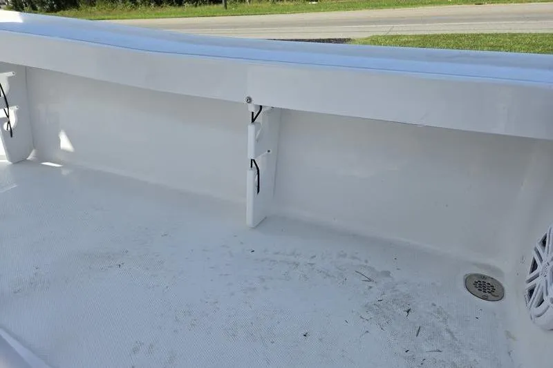 Slide: The Image of 2026 Sea Hunt BX 22 BR boat interior with clean white deck and drainage. - 5