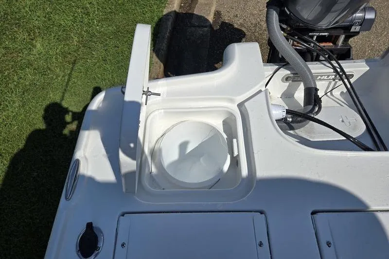 Slide: The Image of 2026 Sea Hunt BX 22 BR boat deck with open storage compartment. - 9