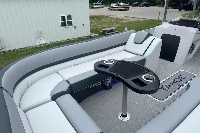 Slide: The Image of Luxurious 2025 Tahoe 2585 boat interior with sleek seating and modern amenities. - 13