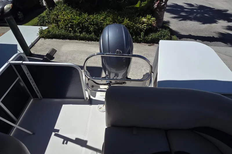 Slide: The Image of 2014 Hurricane FunDeck 216 OB boat with outboard motor, viewed from above. - 14